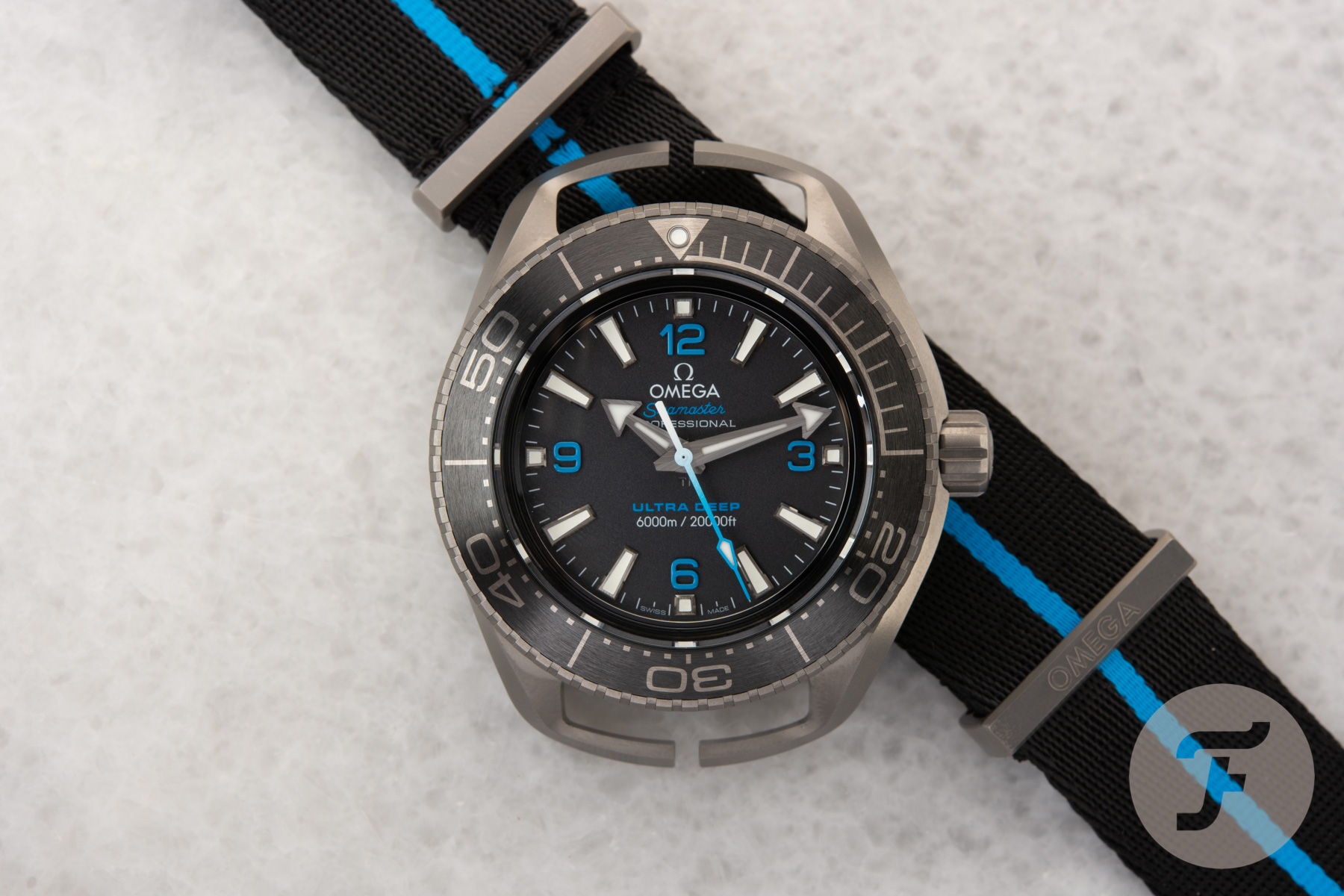 The Best Titanium Dive Watches Currently Available — Top 10 From Rolex, Omega, Grand Seiko, And More