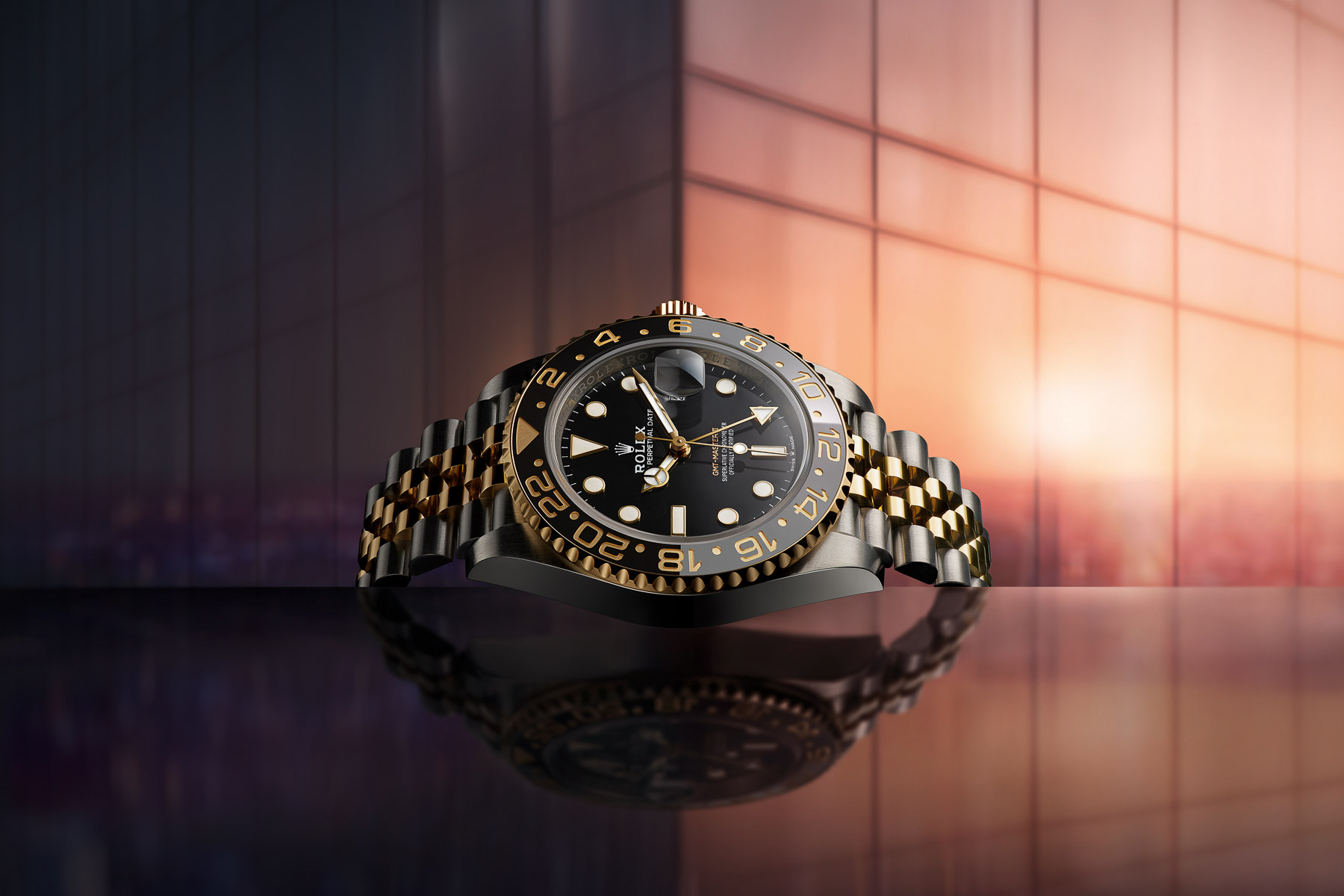Two New Rolex GMT-Master II Models — Going For The Gold With Black and Gray Bezels!