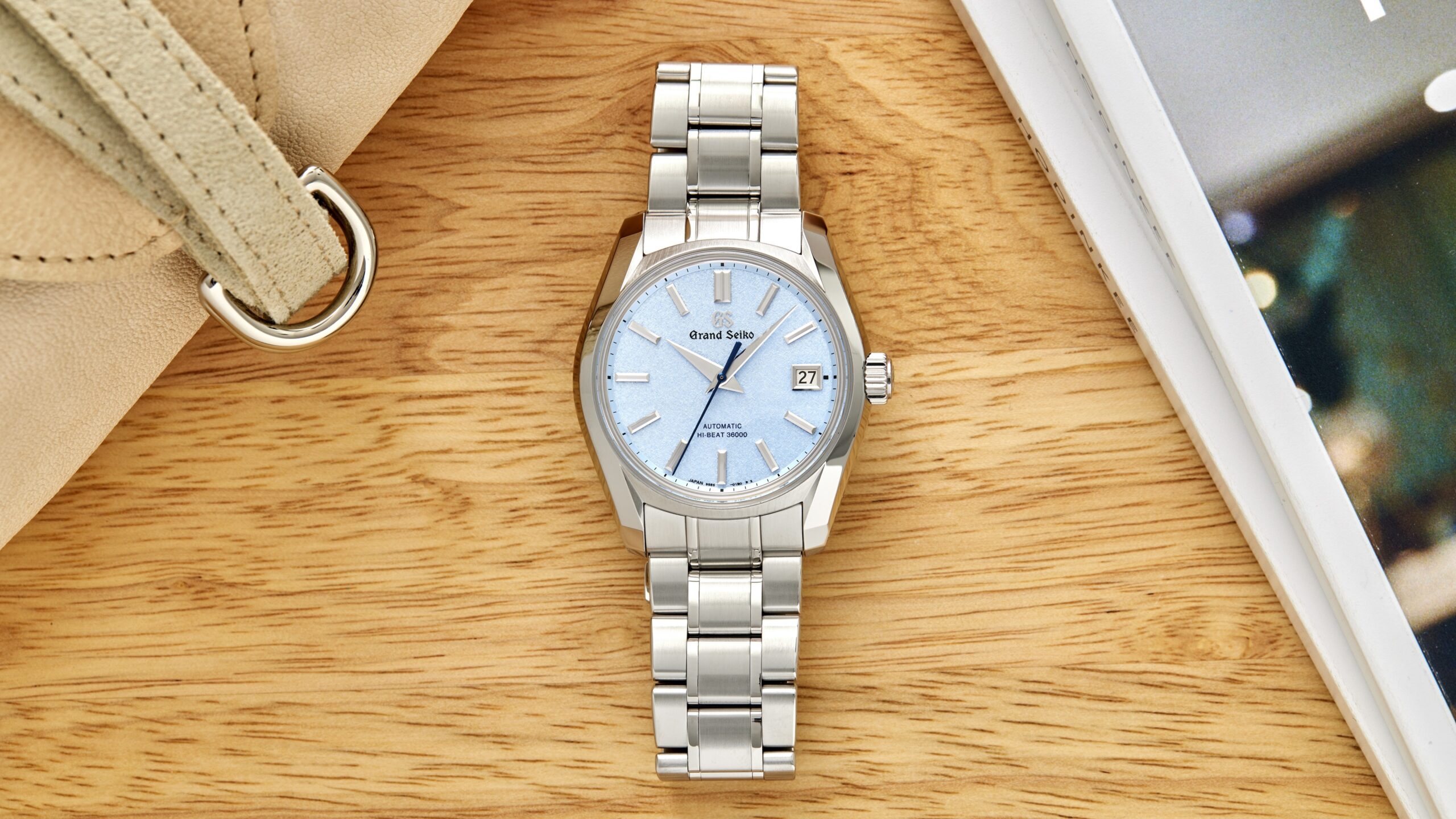 Pre-Owned Picks: A Close-Up Of A Grand Seiko, A Dual Time Vacheron Overseas, And A Cartier Tank Américaine In Full White Gold
