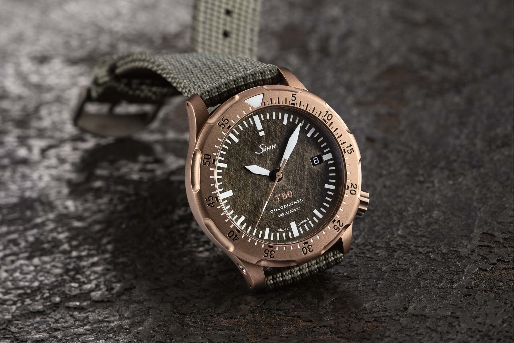 Sunday Morning Showdown: Sinn T50 Goldbronze Vs. Omega Seamaster 300 Bronze Gold