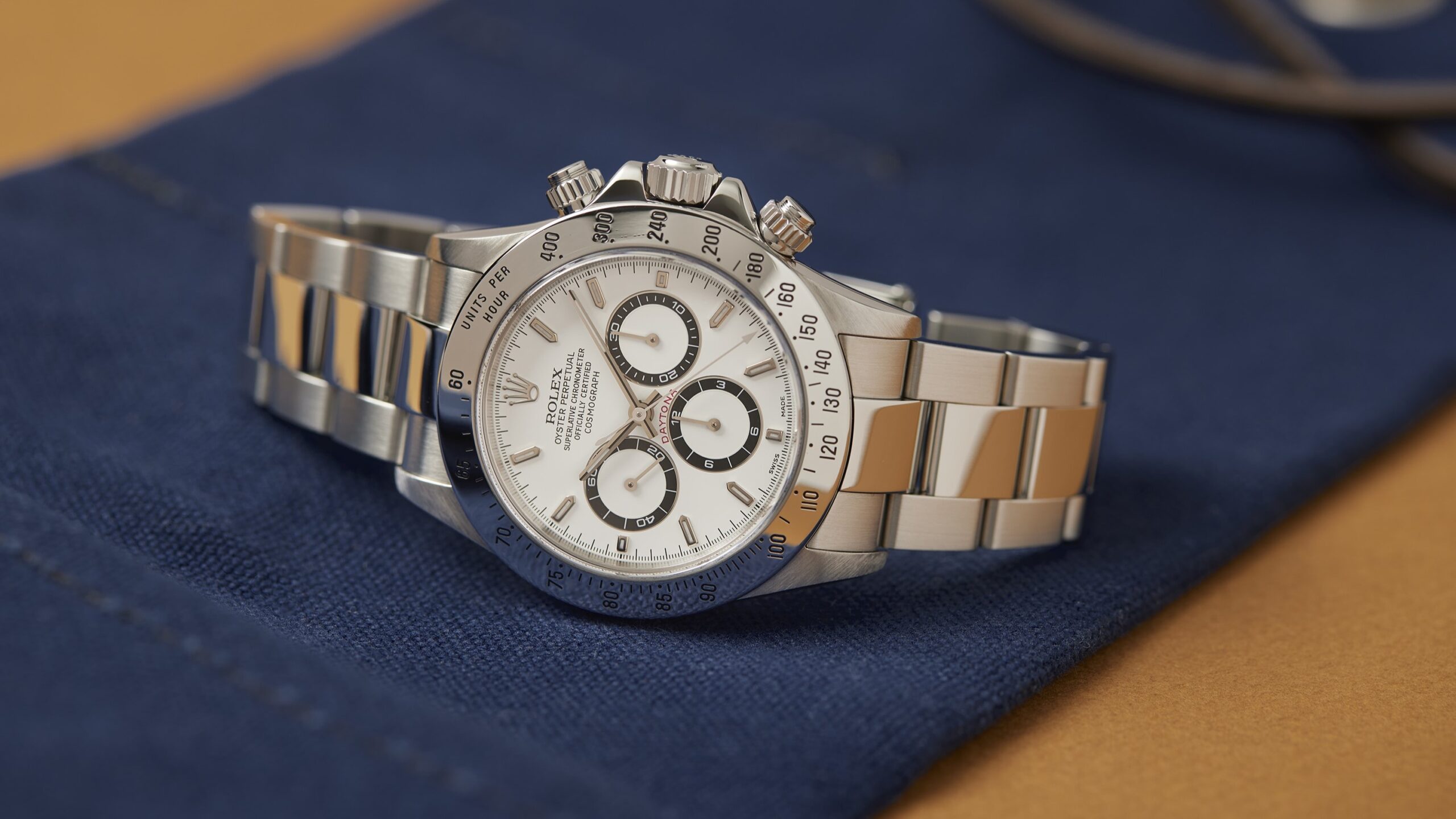Pre-Owned Picks: A Transitional Near-Modern Rolex Daytona, An Omega That Puts Snoopy In Space, And A Stainless-Steel Annual Calendar From Patek Philippe