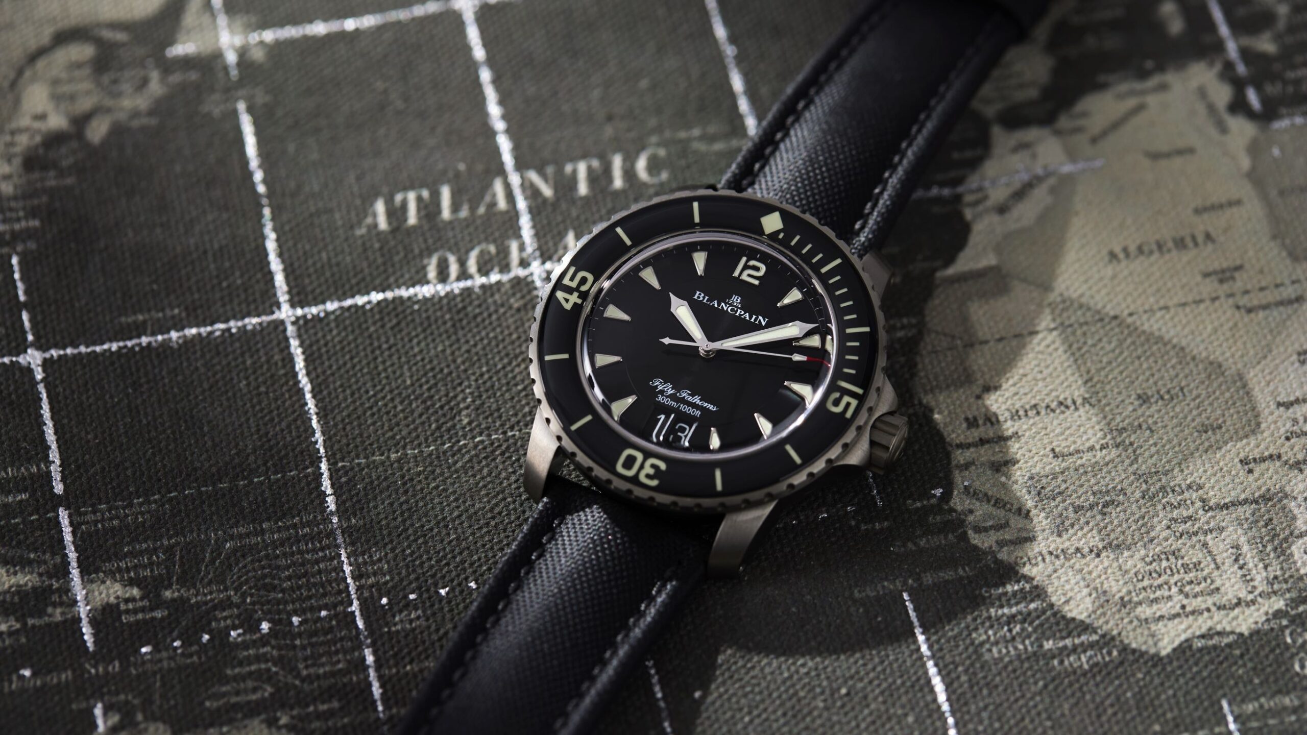 Pre-Owned Picks: A Blancpain Fifty Fathoms ‘Big Date,’ A Rolex GMT ‘Root Beer’ Ref. 16713 With Extra Patina, And An Omega Speedmaster Mark II ‘Racing Dial’