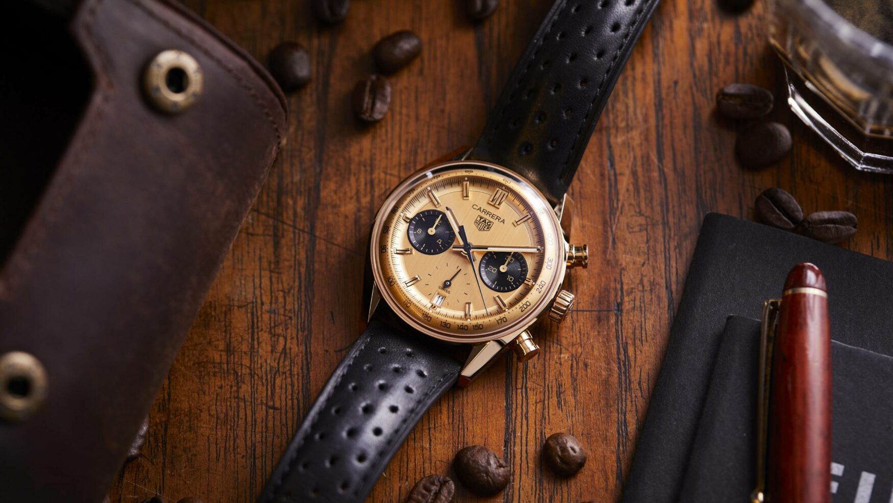 The TAG Heuer Carrera Chronograph Glassbox Gold is covered in motorsports glory