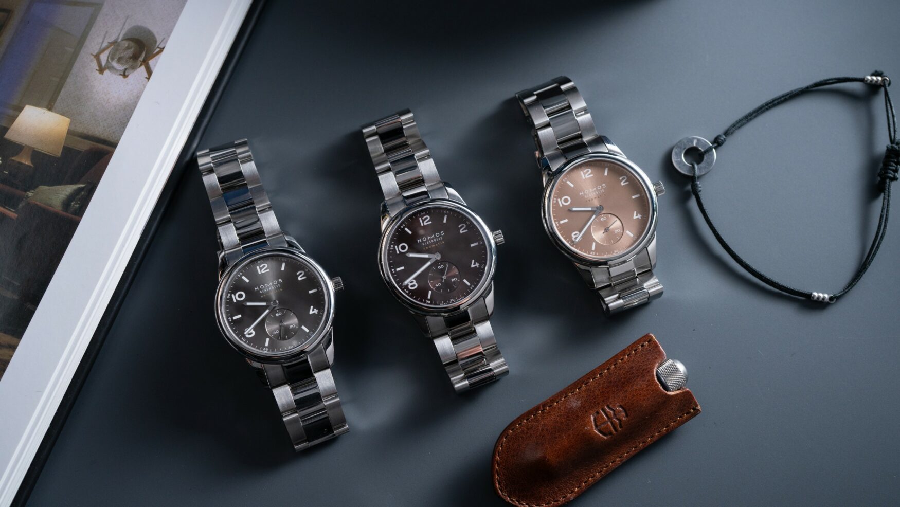 Nomos evoke a warm autumn with the new Club Sport Neomatik 39 Tabac, Ember and Smoke