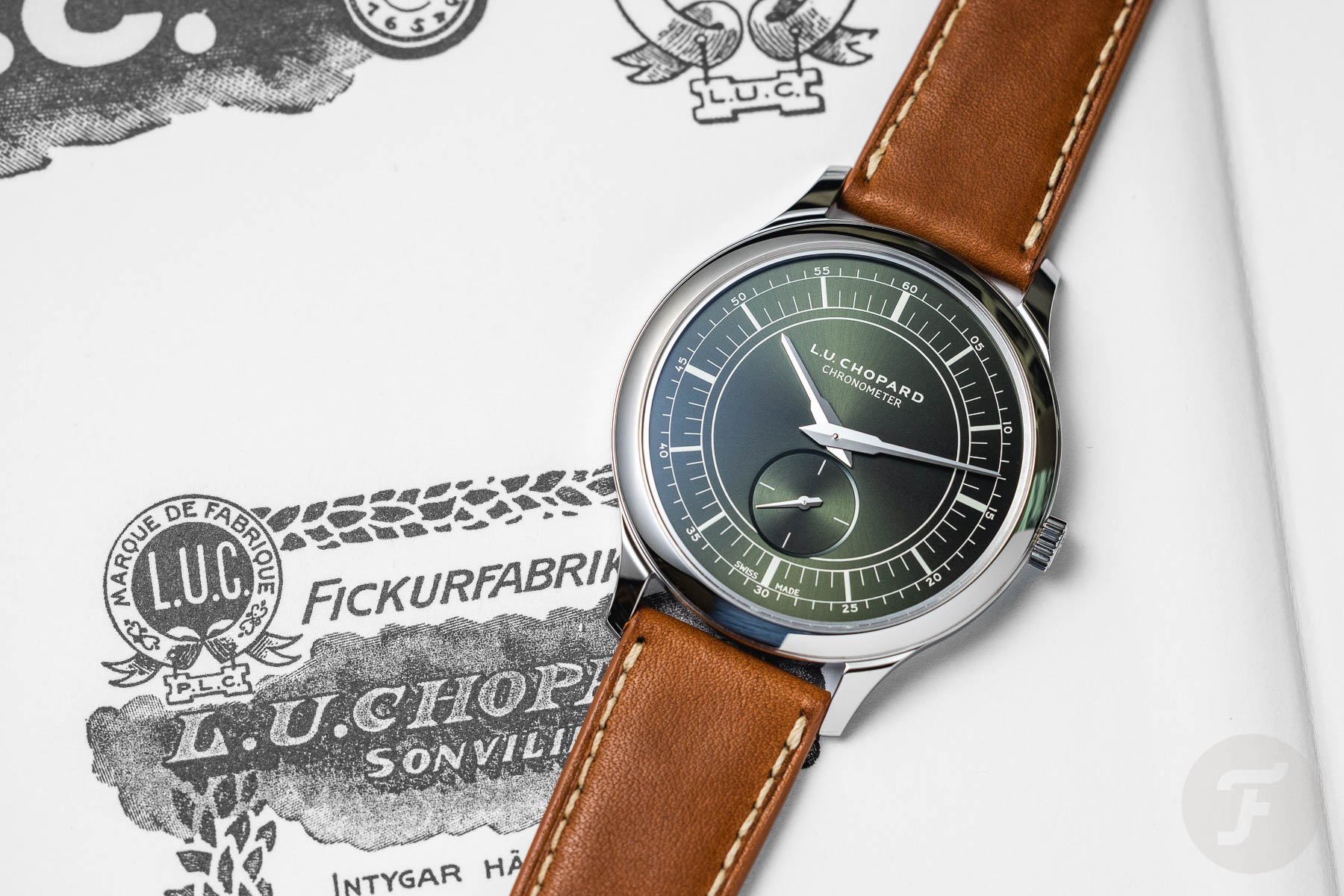 Sunday Morning Showdown: Grand Seiko SLGW003 “Birch Bark” Vs. Chopard L.U.C XPS Forest Green