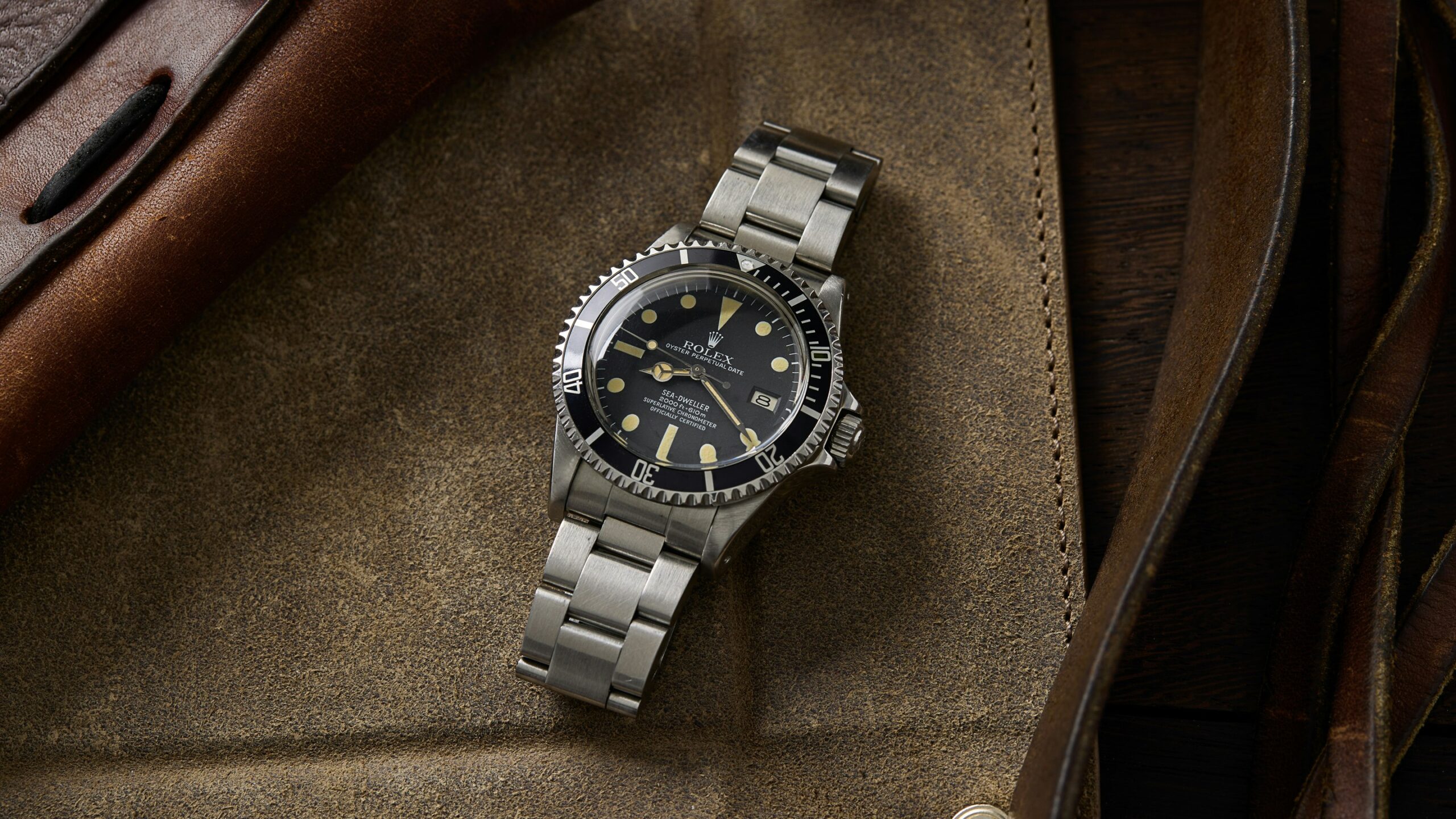 Pre-Owned Picks: A Rolex ‘Great White’ Sea-Dweller, An Omega ‘Ed White’ Speedmaster 321, And A Black Cartier Tank Must