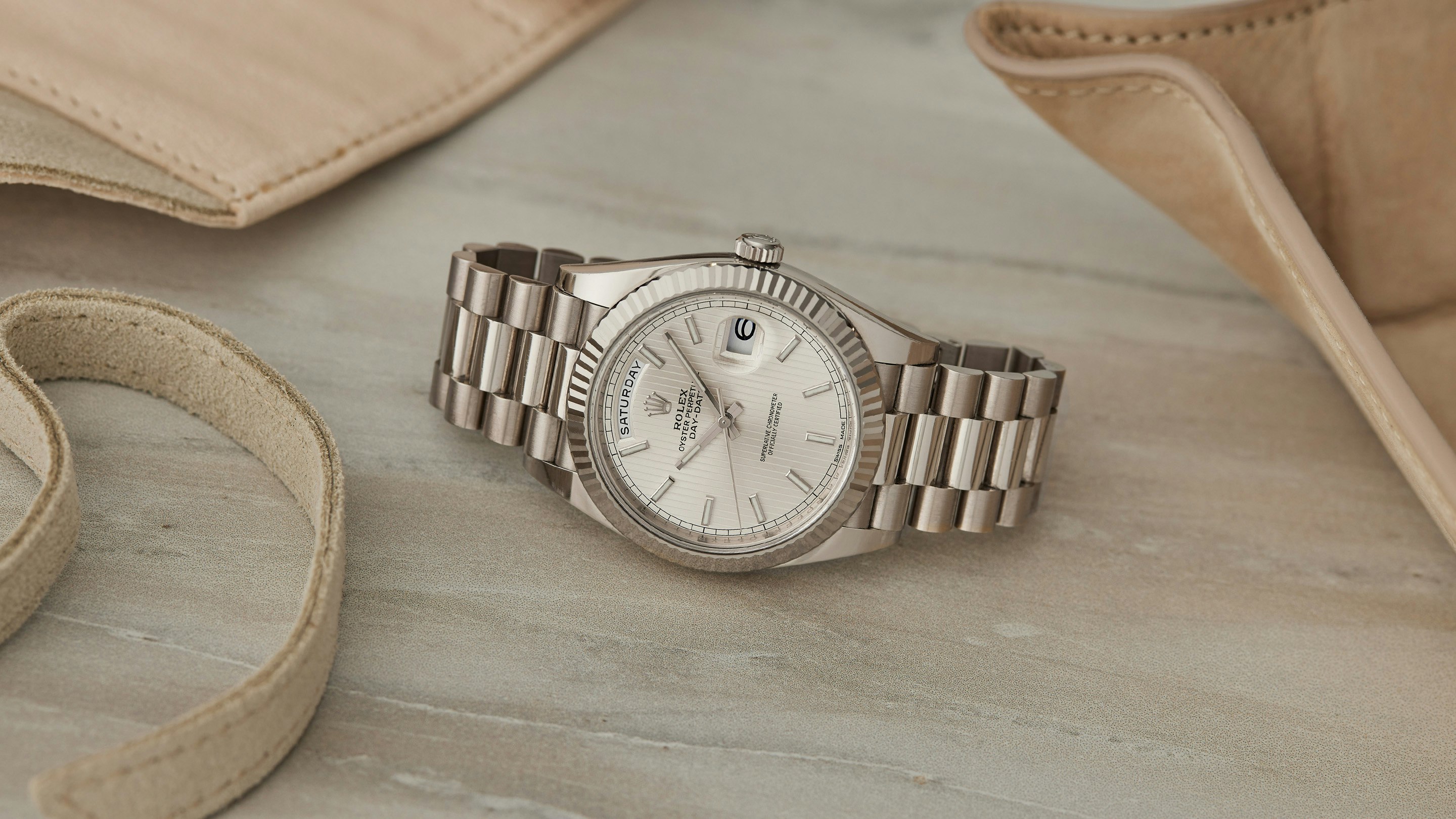 Pre-Owned Picks: A Silver-Toned And Subtle Day-Date, An Annual Calendar From Patek Philippe, And A High-Tech Speedmaster With Mid-Century Charm