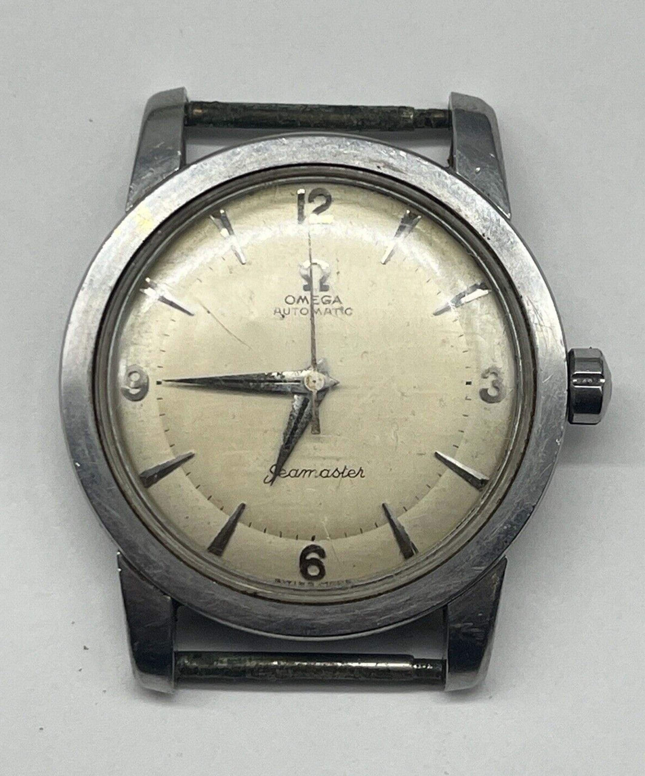 eBay Finds: A Pair of Great Vintage Omegas, A Collectible Swatch, and a (Possibly) Issued Military Watch