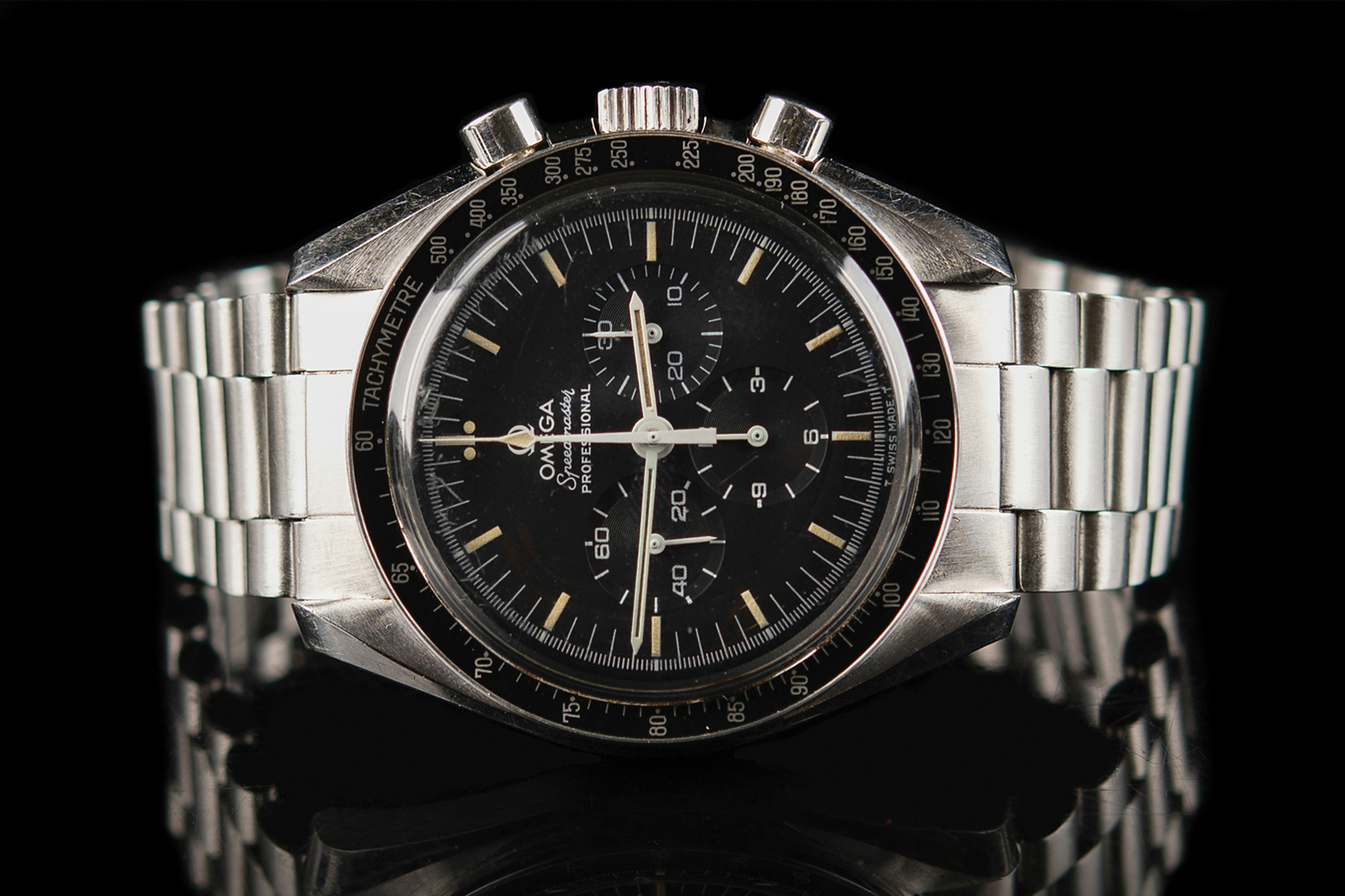 Bring a Loupe: A Space-Worn Omega Speedmaster, A Heuer Carrera, And A CL Guinand Pocket Watch For The Olympic Club