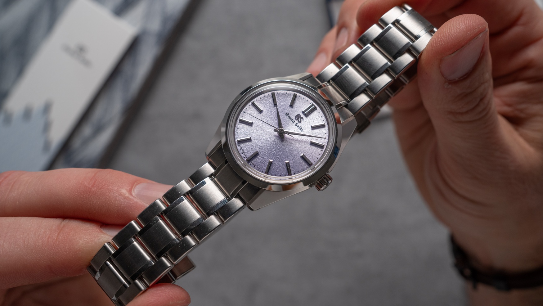 The Grand Seiko SBGW323 ‘Kiri’ blossoms with a elegant purple dial