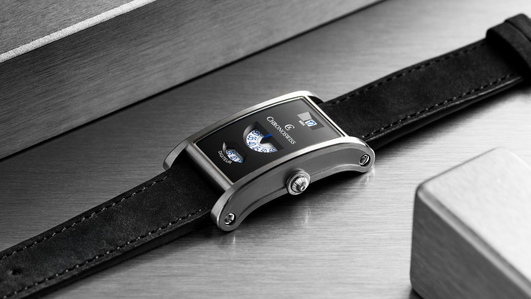 Chronoswiss’ Neo Digiteur pairs jumping hours with digital minutes and running seconds in an interesting take on a montre à guichet