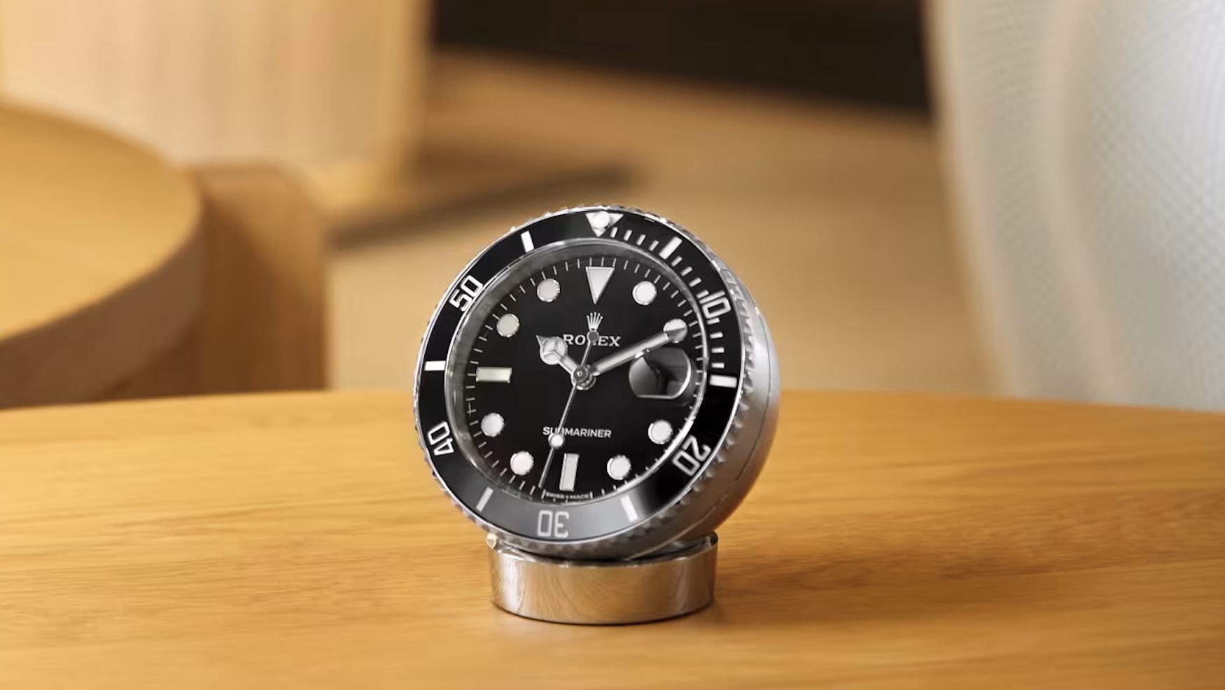 The first new Rolex Submariner Date Desk Clock just sold for how much at auction?!