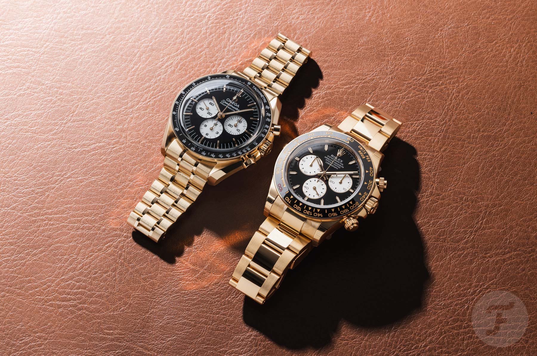 Sunday Morning Showdown: Omega Speedmaster Moonwatch “Reverse Panda” Vs. Rolex Cosmograph Daytona “Le Mans”