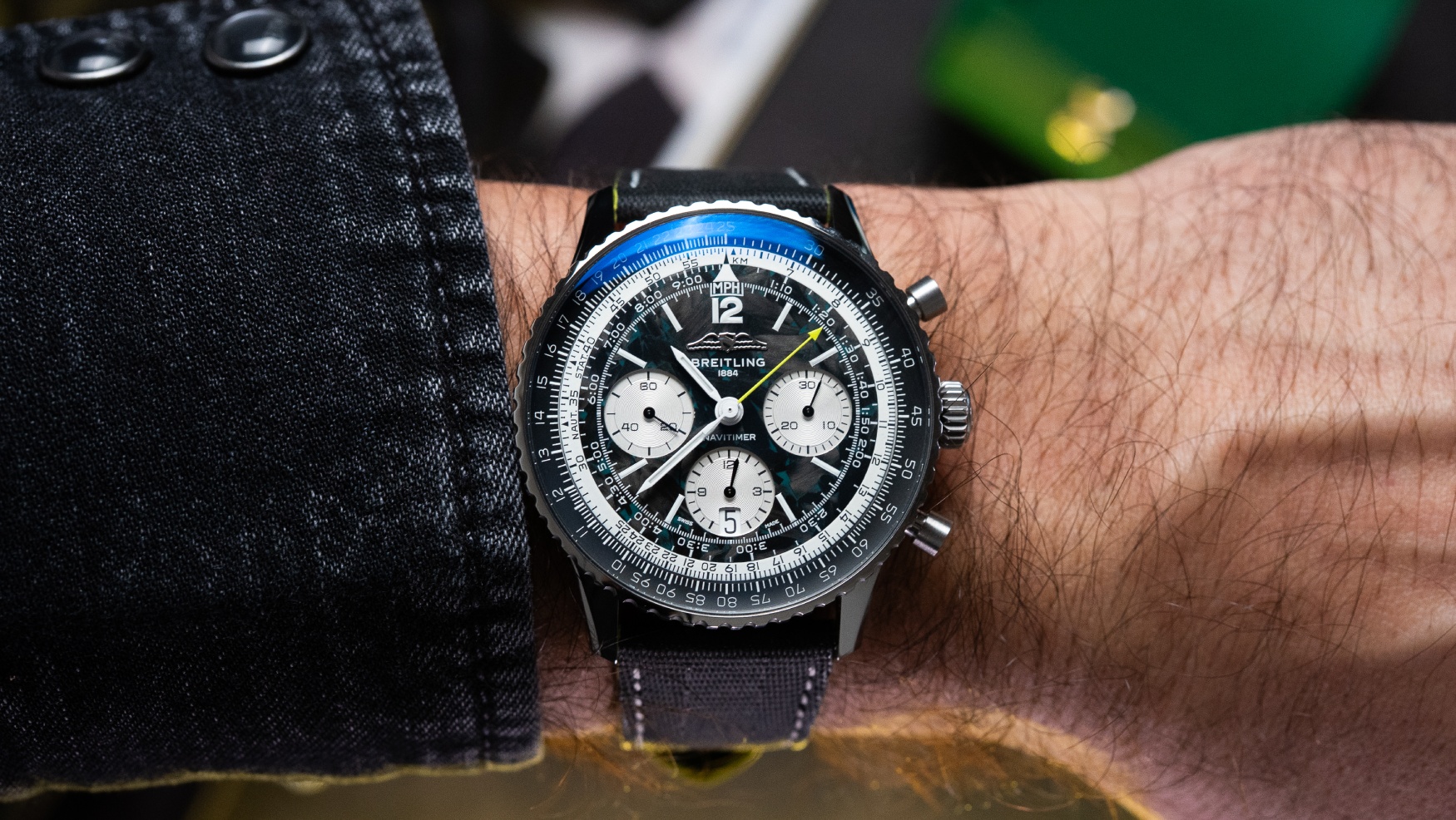 Breitling sets its sights on pole position with new Aston Martin F1 partnership and the first-ever titanium Navitimer