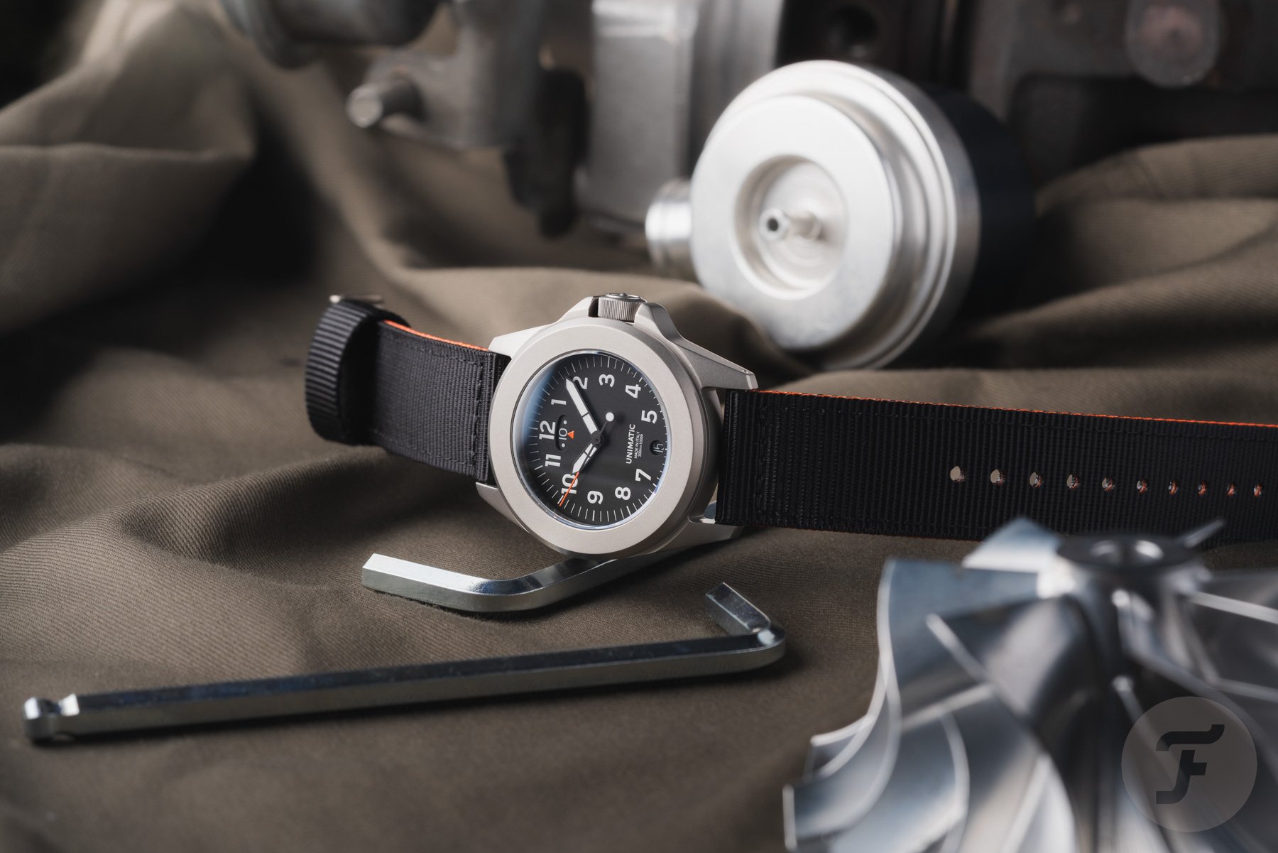 Comparing The New Titanium Unimatic Modello Quattro UT4-U-TI-GMT To The Stainless Steel UT4-GMT