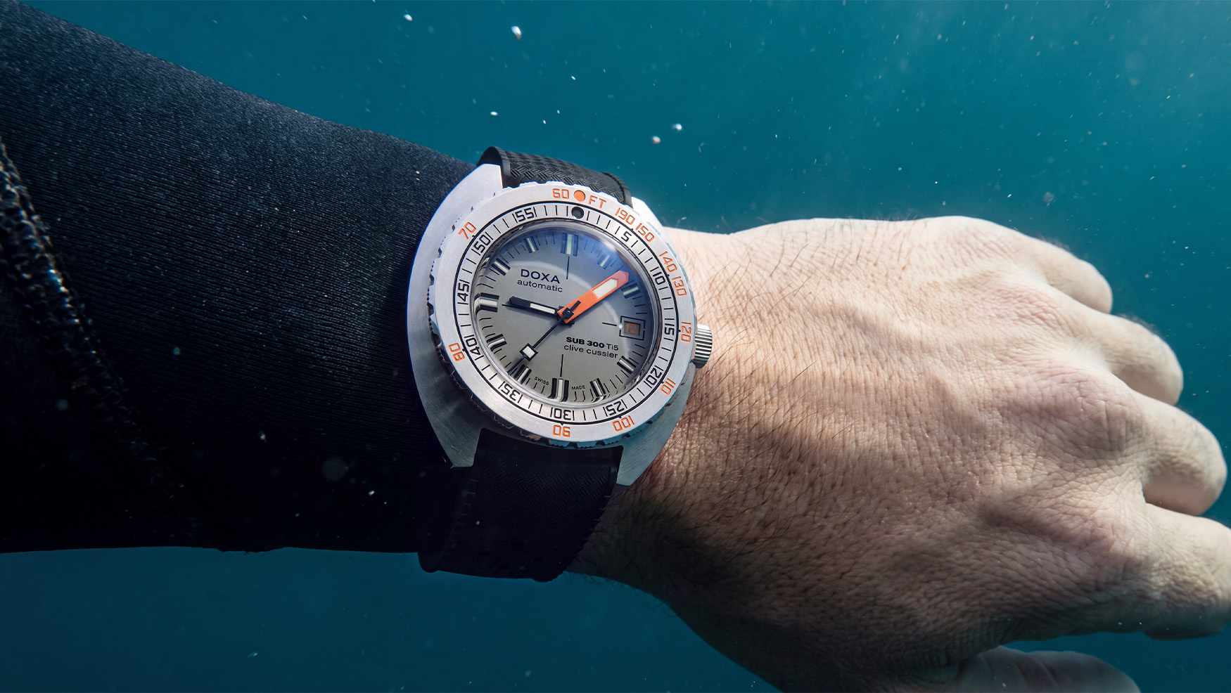 Doxa honours the legendary Clive Cussler with a new titanium-dialled SUB 300