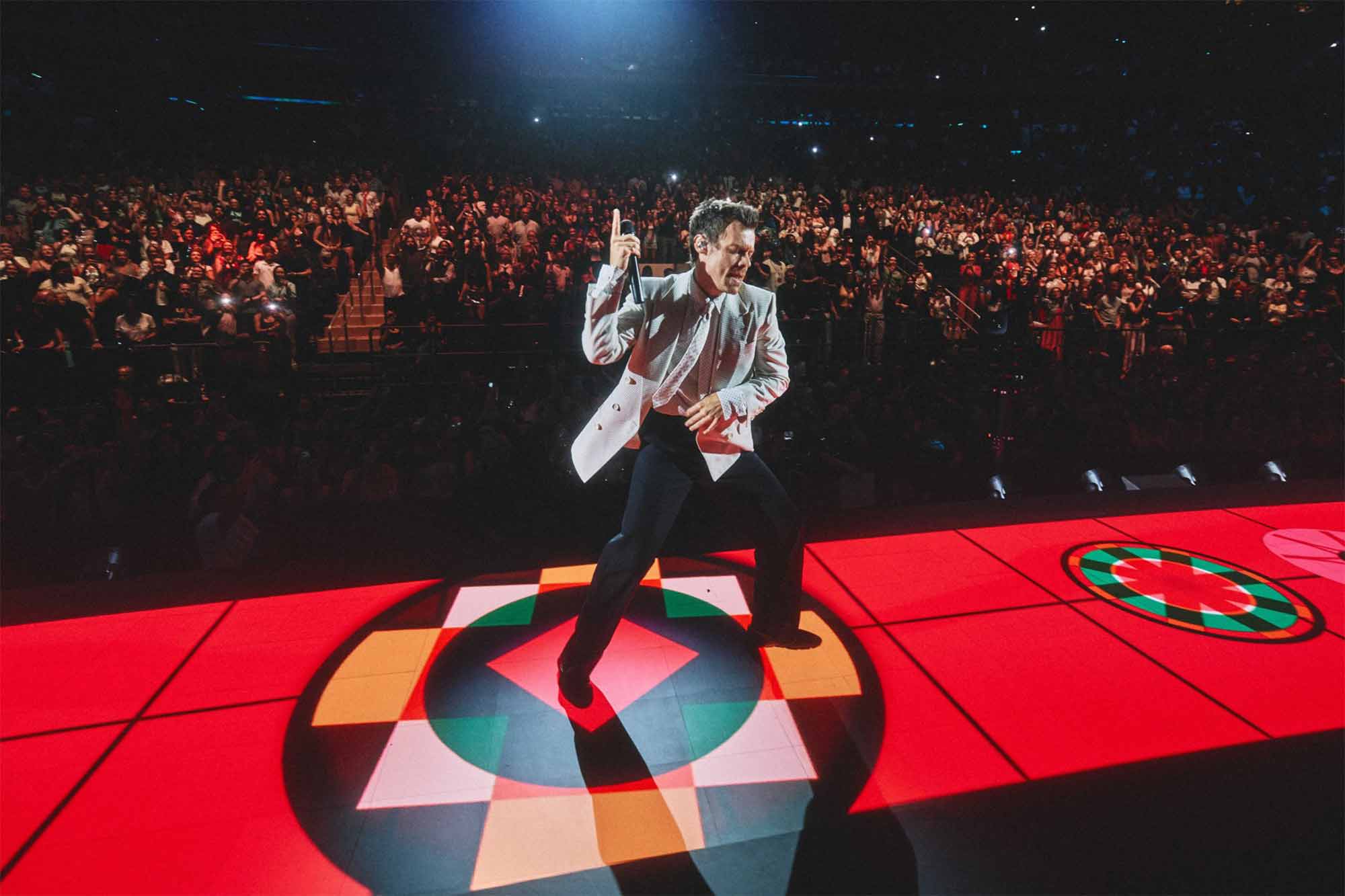 Does Harry Styles’ Latest Corp-Core Costuming Tell Us Something About the Staying Power of Classic Watchmaking?